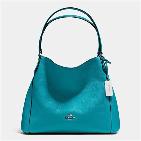 coach turquoise bag.